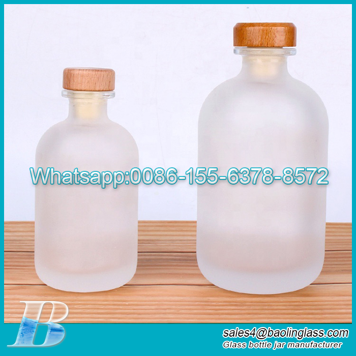 Bottiglia rotonda di alta qualità in vetro per liquore da vino da 250 ml e 500 ml con tappo in sughero sintetico