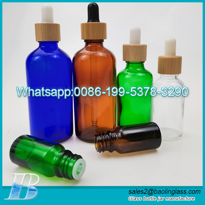 1Frasco cuentagotas de vidrio cosmético personalizado para el cuidado de la piel de oz 50ml 100ml con tapa de bambú para aceite esencial