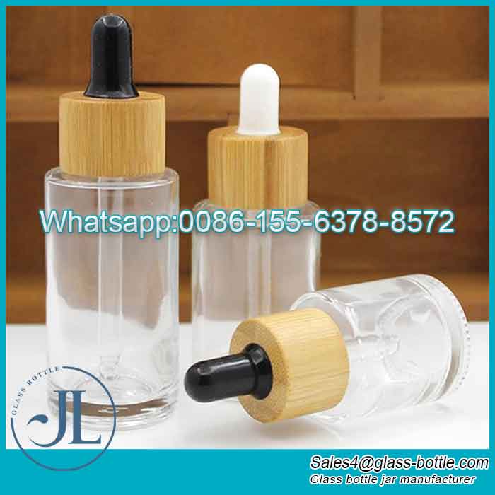 Fornecedor de garrafa de vidro conta-gotas de soro de óleo essencial com tampa de bambu