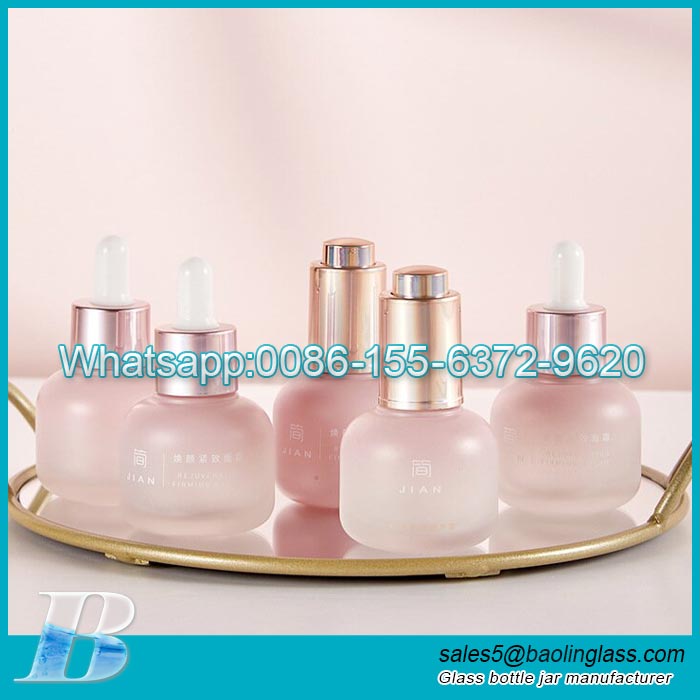 Bottiglia di olio essenziale 30ml cosmetico scrub bottiglia cilindrica pompa a pressione contagocce bottiglia di vetro processo di elaborazione
