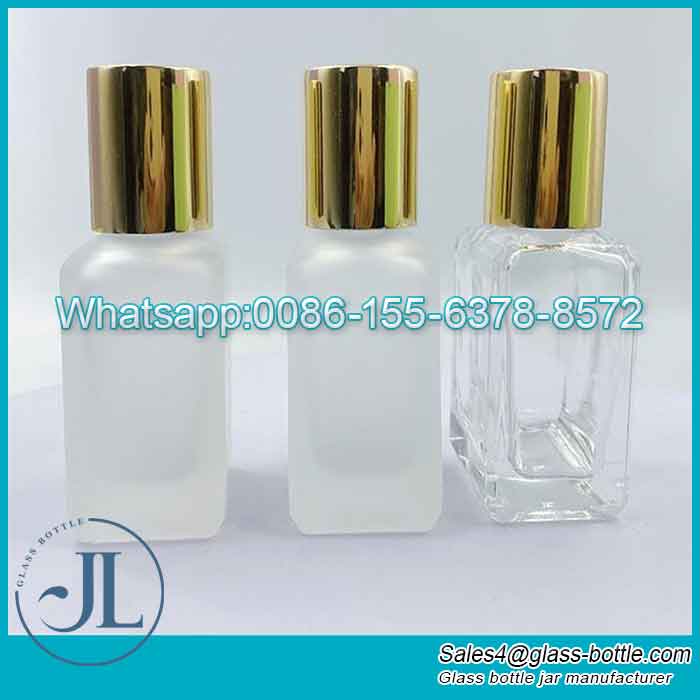 Botella de vidrio de esencia cuadrada esmerilada transparente para aceite facial/cuerpo/cabello/baño