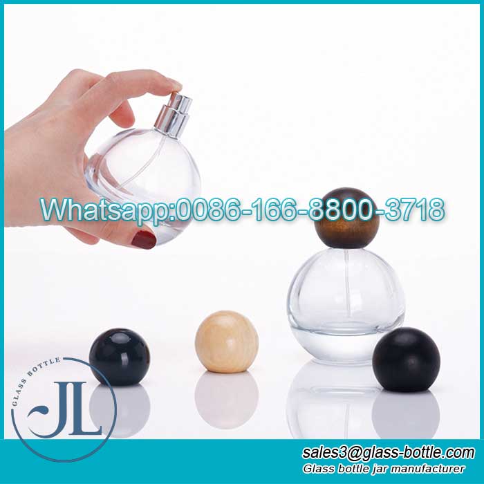 Spot Nuova bottiglia di profumo in vetro a sfera rotonda da 30 ml 50 ml multicapacità in vendita